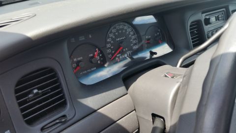 2001 Ford Crown Victoria - Photo of a Ford Crown Victoria instrument cluster and dashboard.