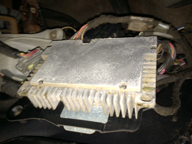 Silver electronic control module with heatsink and wiring harness