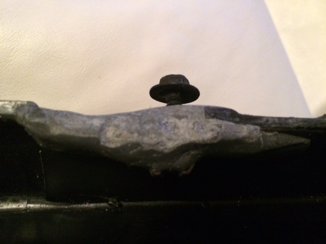 Bolt on a repaired metal bracket
