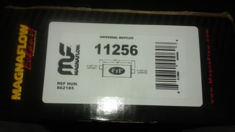 1996 Ford Bronco - A close-up of a label containing the text '11256' and a barcode, with some colored wires visible to the left.