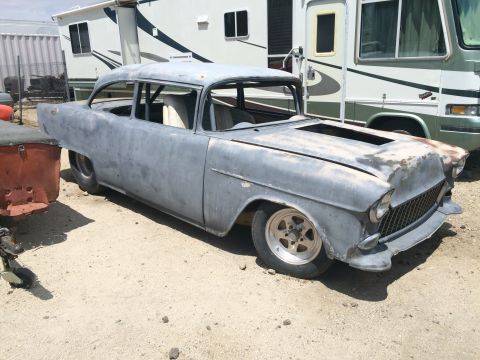 1968 Ford Mustang - Photograph of a 1955 Chevrolet project car, not a technical document.