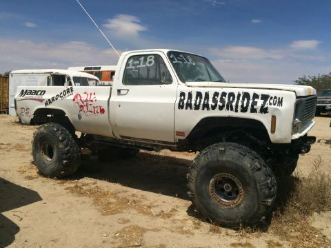 1968 Ford Mustang - Photograph of a lifted Chevrolet monster truck, not a technical document.