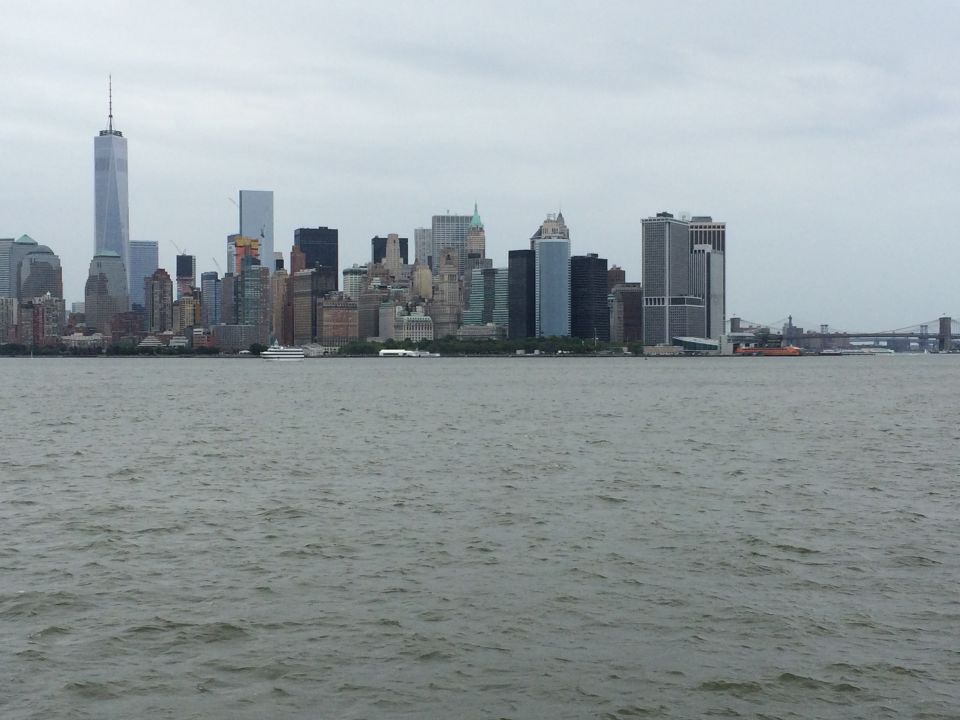 Lower Manhattan skyline with the Brooklyn Bridge across the harbor