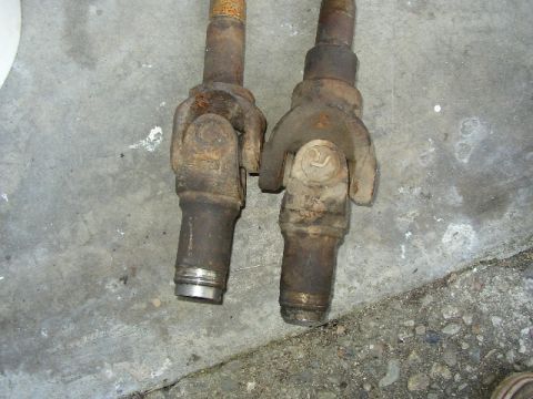 1989 Ford Bronco - Close-up of two driveshaft U-joints, likely for a Ford vehicle.