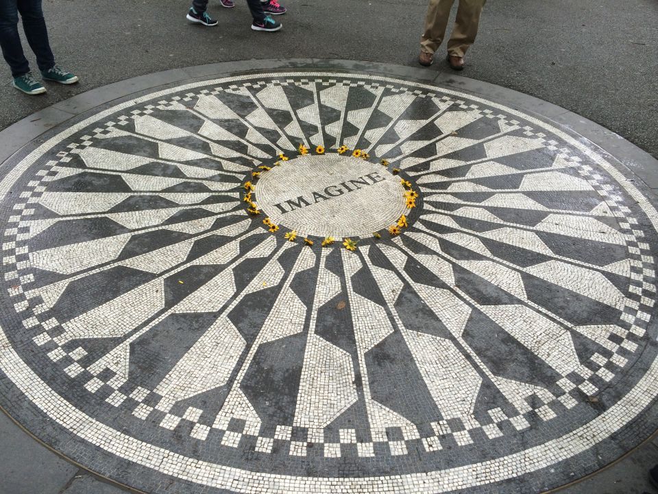 Imagine mosaic in Strawberry Fields with visitors' feet at the edge