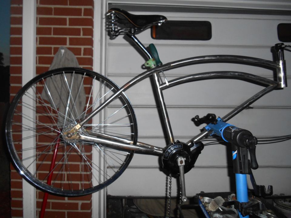 Chrome bicycle frame with sprung seat and 3-speed hub