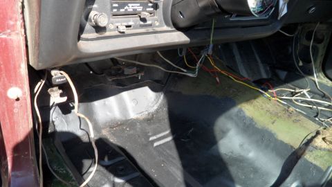 1972 Ford Ranchero - Interior view of a 1972 Ford Ranchero, highlighting the dashboard and exposed floor wiring.