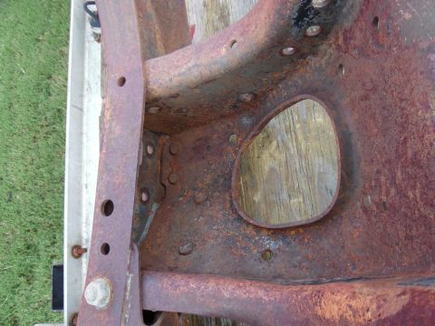 1993 Ford Bronco - There were weeds rooting into the decaying leaves in here, which is why it's so rusty.
