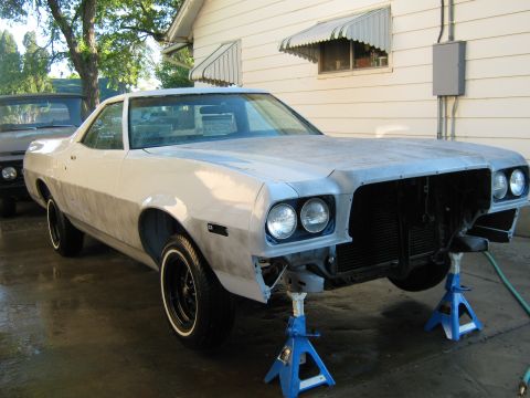 1973 Ford Ranchero - This 1973 Ford Ranchero is undergoing front-end work, supported by jack stands.