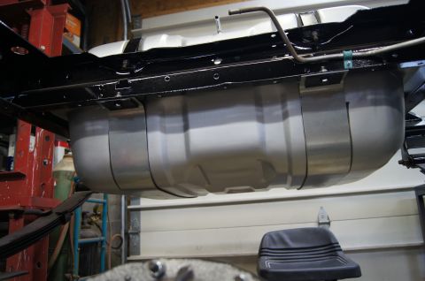 1979 Ford Bronco - Underside view of a vehicle's fuel tank and frame components.