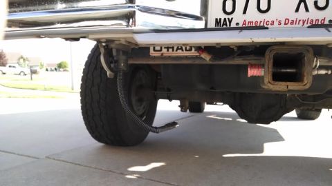 1994 Ford Bronco - The rear view of a 1994 Ford Bronco shows its trailer hitch and a Wisconsin license plate.