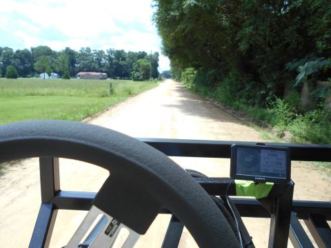 1992 Ford Bronco - Driving down a dirt road with a GPS unit showing speed and distance.