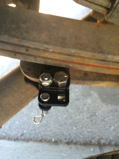 1997 Dodge 3500 - Aftermarket suspension part installed on a vehicle's leaf spring assembly.
