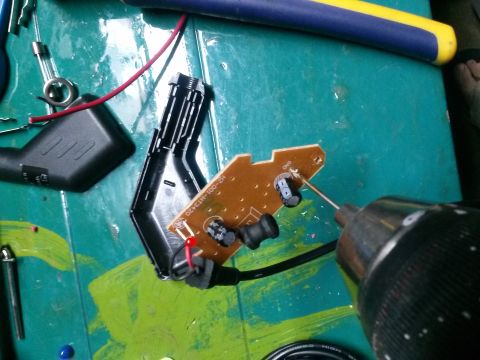 1996 Ford Bronco - drill out the holes enough to insert new wire