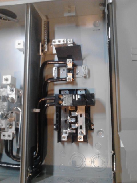 1989 Ford Bronco - This is an image of the interior of an electrical panel box, showing wiring, circuit breakers, and terminal blocks. There are no vehicles o…