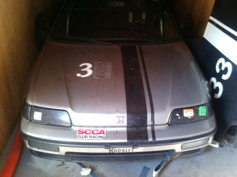 1991 Honda CRX - Front view of a 1991 Honda CRX race car, marked with number 3 and racing decals.