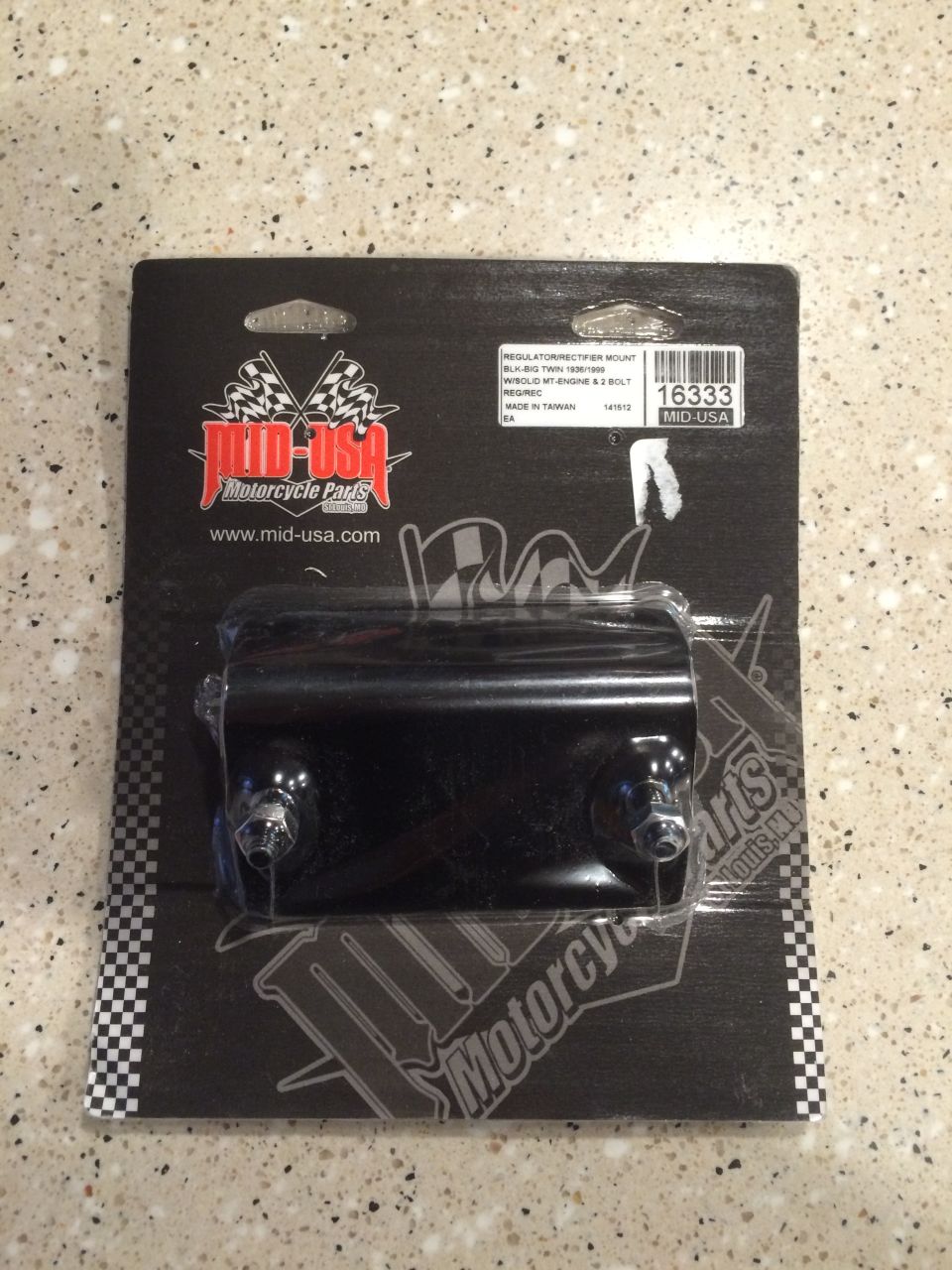 Black motorcycle regulator/rectifier mount in packaging