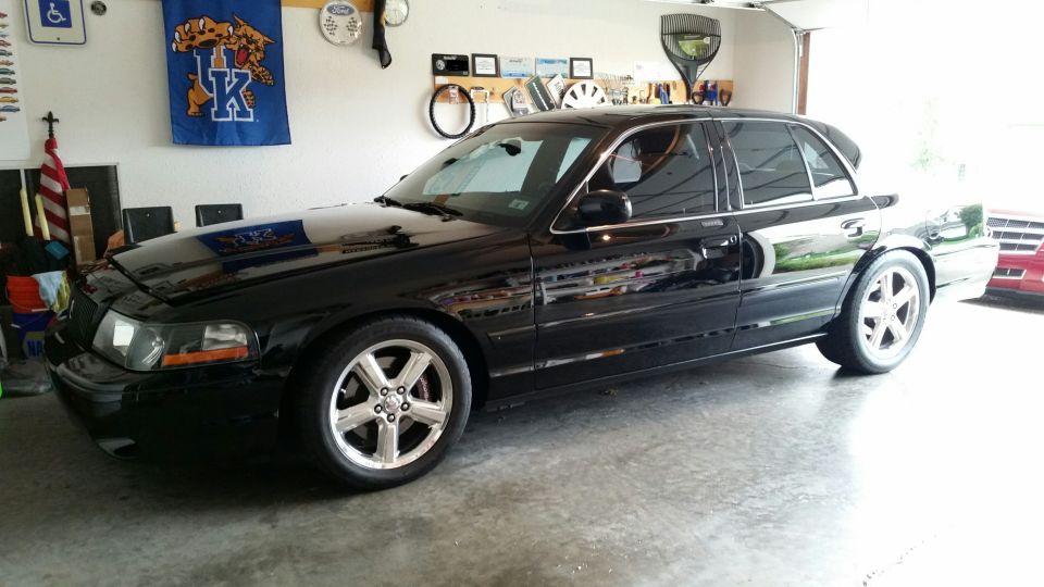 Black 2003 Mercury Marauder parked in garage