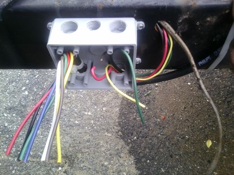 1991 Honda CRX - An exposed electrical junction box with many wires, some connected, some loose.