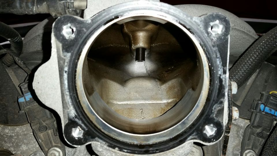 Throttle body interior with visible number '1' marking