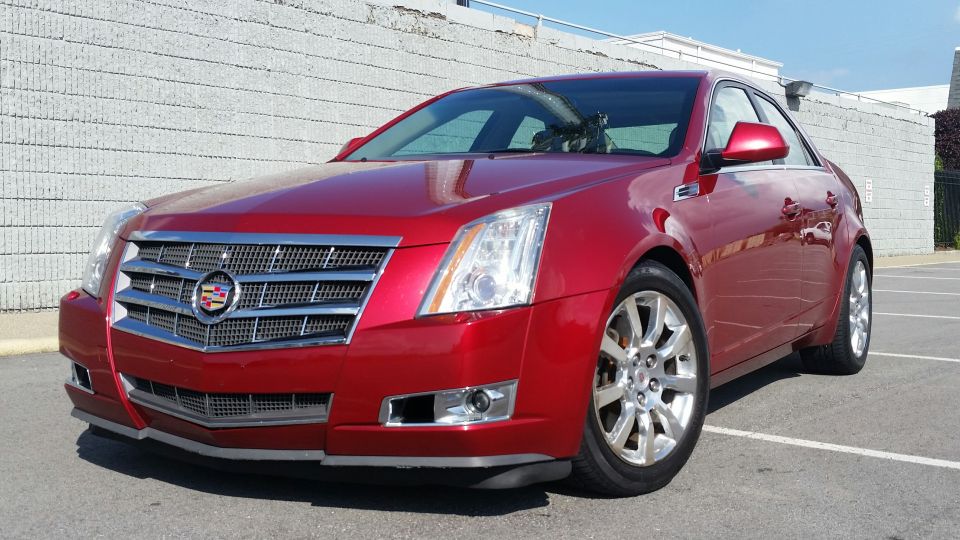 Red 2008 Cadillac CTS 3q-front view
