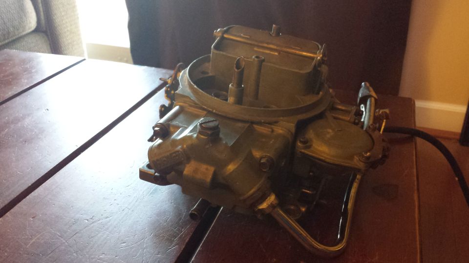 Carburetor on wooden table