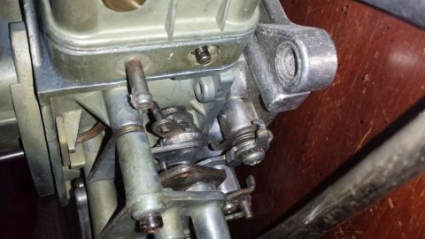 1995 Ford Bronco - Carburetor linkage detail, showing mechanical components and connections.