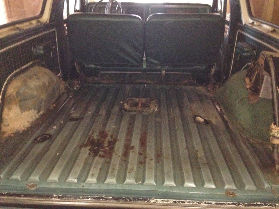 1979 Ford Bronco interior cargo area showing ribbed floor and rear seats