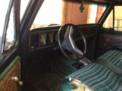 1979 Ford Bronco - Interior view of a vintage vehicle, showing the dashboard, steering wheel, and seats.