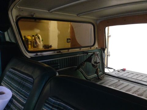 1979 Ford Bronco - Interior view of a 1979 Ford Bronco, including the rear seating and cargo space.