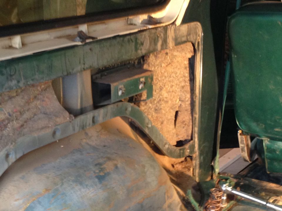 Interior door panel and green seat of a 1979 Ford Bronco