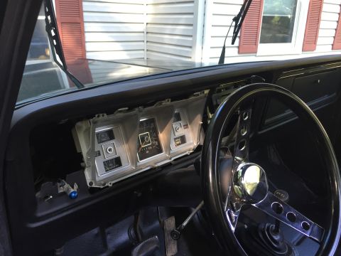 1979 Ford Bronco - Interior view of a 1979 Ford Bronco, the dashboard and steering wheel.