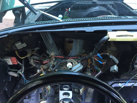 1979 Ford Bronco - The dashboard wiring is exposed, showing a complex network of wires and connectors.