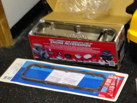 1979 Ford Bronco - A new Edelbrock valve cover gasket set is displayed in front of an open box containing a chrome valve cover. The box features text and imag…