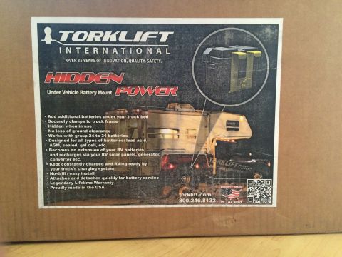 1997 Dodge 3500 - A label on a cardboard box displays text and a graphic, with no visible vehicle information.