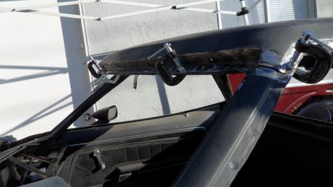 1972 Ford Ranchero - Clamps hold the car's roof in place during repair work.