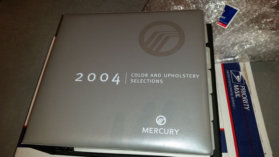 2004 Mercury dealership exterior and interior sample guides. Includes the Marauder. $50