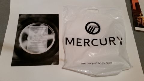 2003 Mercury Marauder - Mint Marauder poster and bag handed out at the 2002 Hot Rod Power Tour, at the Marauder exhibit. *SOLD*