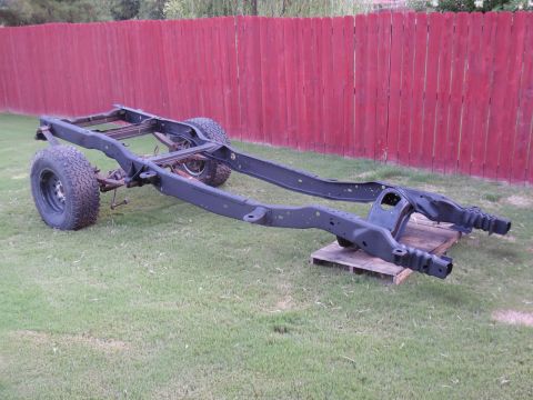1993 Ford Bronco - I wire-wheeled & painted the spring eye bolts, then coated them with anti-seize lube before installing them in the new Energy black poly bu…