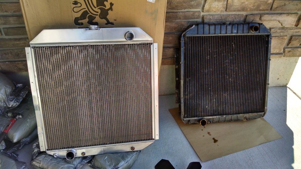 New aluminum radiator beside old radiator