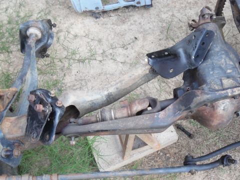1993 Ford Bronco - These pivot brackets are clean & receiving undercoating, but I can't set the frame back on this axle until the RA bushings arrive. I'm abou…