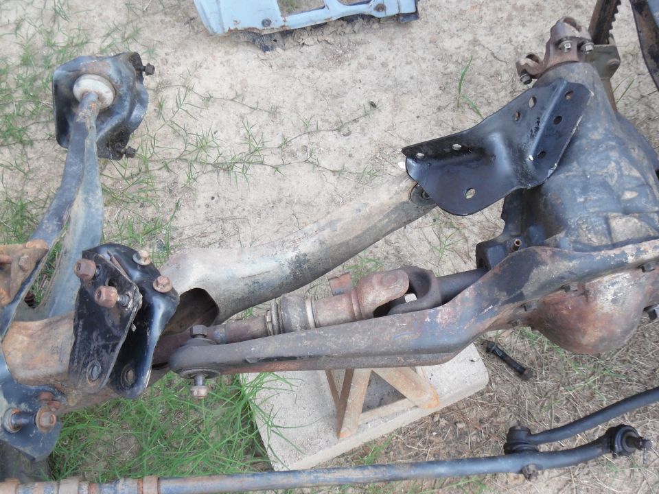 These pivot brackets are clean & receiving undercoating, but I can't set the frame back on this axle until the RA bushings arrive.  I'm about to press out those pivot bushings & install the Energy black poly pivots...