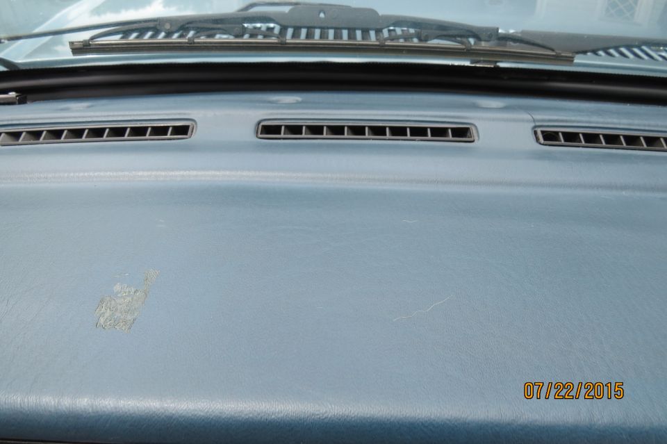 Light blue dashboard with air vents and date stamp