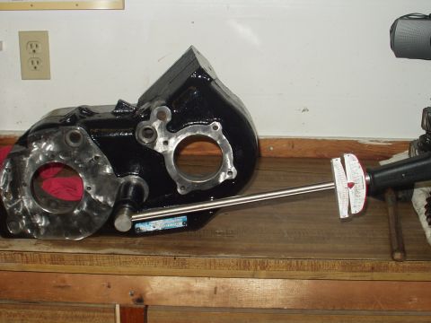 1978 Ford Bronco - Torque to 90-130 ft-lbs. When assembling the idler gear assmbely I put the four spacers on the front output yoke side, of the spacer.