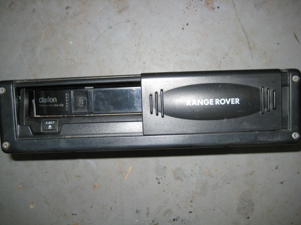 Black Clarion car stereo with Range Rover logo