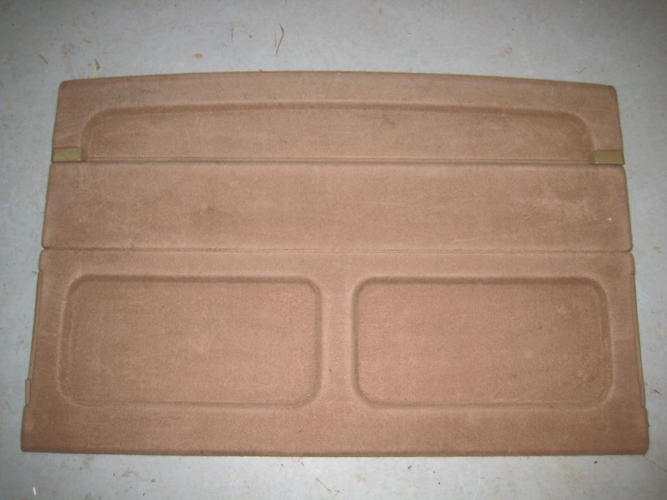 Tan parcel shelf with two recessed rectangles