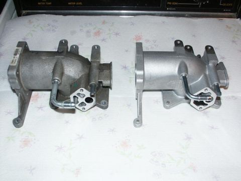 2001 Mercury Grand Marquis - Two intake manifolds are shown side-by-side, one appearing used and the other clean.