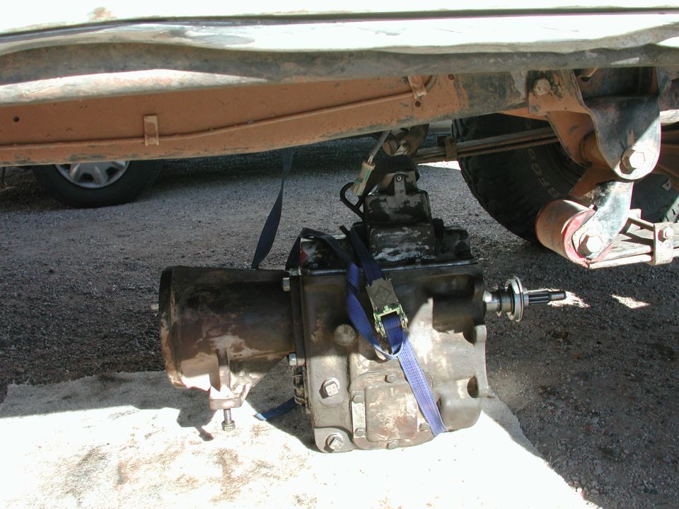 here is the problem; 120+ lbs of NP435, gravel driveway and no one i can really depend on to help me throw it in...