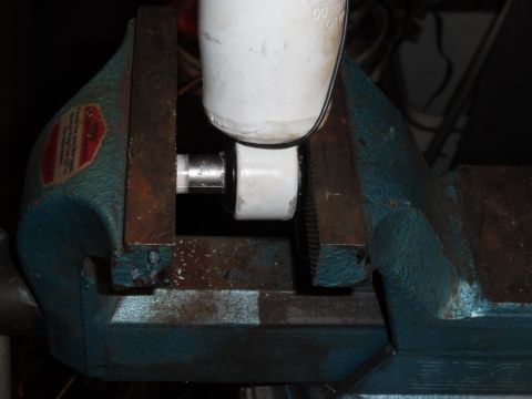 1993 Ford Bronco - With a little silicone grease, the new bushing (9.8141G) goes straight into the shock eye with no sockets; just wiggle the shock as the vis…