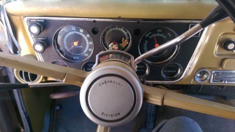 1968 Chevrolet C/K Pickup - The interior of a Chevrolet C/K Pickup, with a focus on the dashboard and instrumentation.